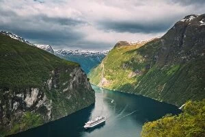 Images Dated 19th June 2019: Geirangerfjord, Norway. Touristic Ship Ferry Boat Cruise Ship Liner Floating Near Geiranger In