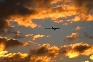 Unmanned Prints: The General Atomics MQ-9 Reaper unmanned aerial vehicle flies a training mission at sunset at Creech Air Force Base