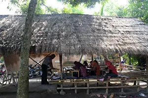 Turned Prints: A general view of the classroom porch where locals study English language in the village of Pare