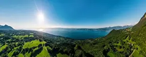 Geneva lake aerial panoramic view from drone, sunset time, France