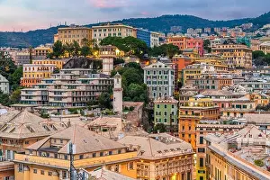 Genova, Italy city skyline view towards the historic belvedere castelletto at twilight