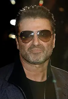Head Shot Prints: George Michael arriving at the premiere of Sleuth
