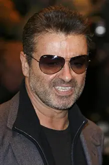 Head Shot Prints: George Michael arriving at the premiere of Sleuth