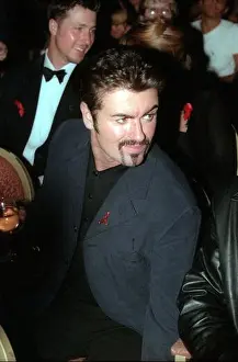 Beard Prints: George Michael at Canon Designs for Life Fashion Show in London on 21st September 1998