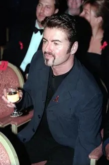 Beard Prints: George Michael at Canon Designs for Life Fashion Show in London on 21st September 1998