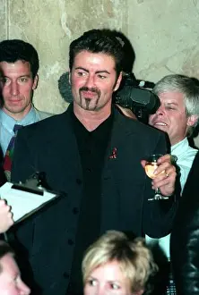 Beard Prints: George Michael at Canon Designs for Life Fashion Show in London on 21st September 1998