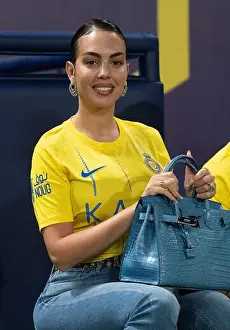 Saudi Arabia Prints: Georgina Rodriguez poses on the pitch wearing Guess jeans and Le Silla boots