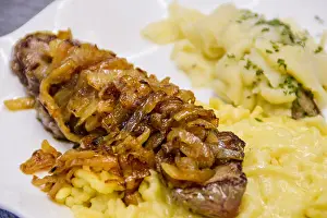Noodle Prints: German food. Spätzle, beef steak and pork medallion with saukraut