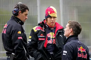 Red Bull Prints: German Formula One driver Sebastian Vettel of Red Bull (C) talks to race engineer Guillaume Rocquelin (L)