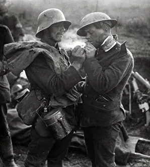 German soldier giving a British soldier a light during a Christmas Truce in World War One