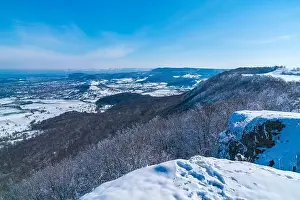 Germany, Aerial panorama view from swabian jura mountains in winter wonderland scene covered with snow