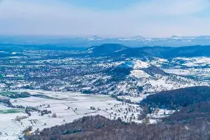 Snow Cover Prints: Germany, Aerial panorama view above swabian jura mountains in winter wonderland scene covered with snow around limburg
