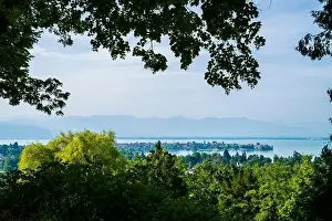 Summer Trees Prints: Germany, Lindau old town houses on island surrounded by silent bodensee lake water early morning