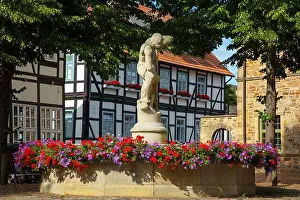 Lower Town Prints: Germany, Lower Saxony, town of Rinteln, fountain on the church square