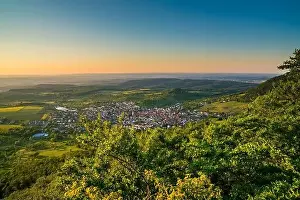 Germany, Panorama view above green landscape of beuren city houses and mountains of swabian jura scenery
