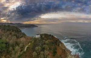Cantabrian Prints: Getaria lighthouse at dusk, Basque country - drone aerial view
