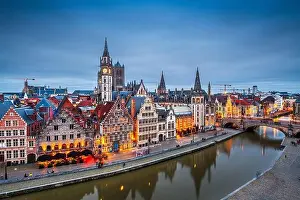 Ghent, Belgium old town cityscape from the Graslei area at dusk