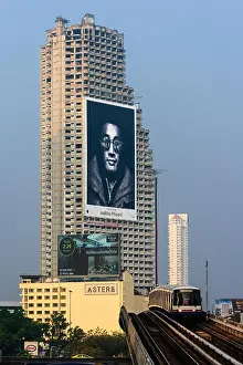 Condo Prints: Giant Apple Advertising for iphone on Sathorn Unique Tower an unfinished skyscraper in in Sathorn District