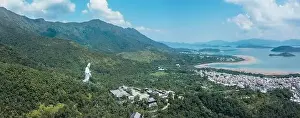 Giant Guanyin, Goddess Statue in countryside landscape of Tai Po, Hong Kong, daytime, clear day