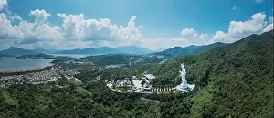 Giant Guanyin, Goddess Statue in countryside landscape of Tai Po, Hong Kong, daytime, clear day