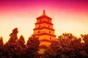 Xian Prints: The giant wild goose pagoda or Dayan Pagoda at sunset located in Da Cien Temple complex in Xian China on an overcast