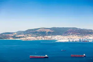 Iberia Prints: Gibraltar strait with passing tankers at sunny day