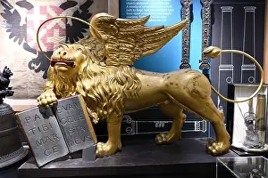 Gilt Prints: Gilded statue of a winged lion with a halo representing St Mark the Evangelist