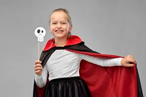 Photo Booth Prints: girl in costume of dracula with cape on halloween