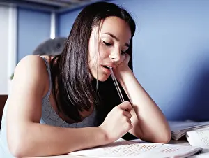 Teenage Girl Prints: Girl doing homework in bedroom