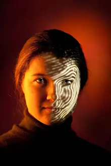 Imprinting Prints: Girl with fingerprint projected on face