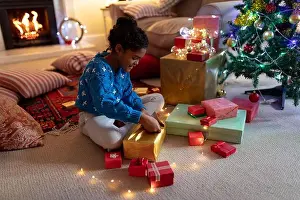 Gifts Prints: Girl at home at Christmas time