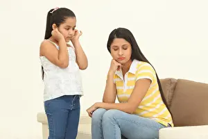 Forgiveness Prints: Girl saying sorry to her mother her pulling ears