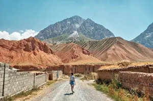 Girl in front of Taldyk Mountain Pass in Kyrgyzstan taken in August 2018