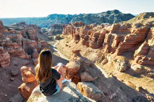 Girl Watching over Charyn Canyon in South East Kazakhstan taken in August 2018 taken in hdr