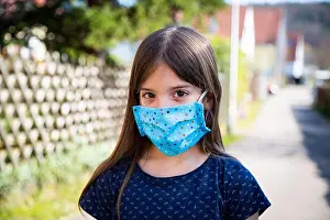 Threat Prints: Girl wearing homemade protective mask