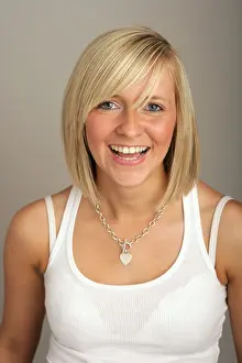 Vest Prints: A girl wearing a white top laughing