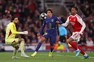 Arsenal Prints: Giuliano Simeone of Atletico Madrid in action with Gabriel and David Raya of Arsenal - Arsenal v Atletico Madrid