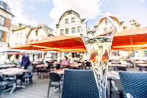 Travel Europe Prints: Glass of champagne in restaurant at market square of Troyes