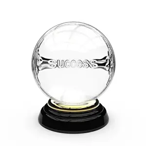 Telling Prints: Glass crystal ball with a white coloured word success in the middle mounted on a gold ring