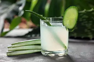 Remedy Prints: Glass of fresh aloe vera juice on table