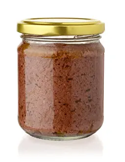 Toast Prints: Glass jar of black olive paste isolated on white