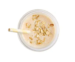 Vanilla Prints: Glass of tasty smoothie with oatmeal on white background