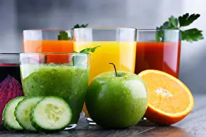 Balanced Prints: Glasses with fresh organic vegetable and fruit juices. Detox diet