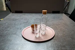 Water Bottle Prints: several glasses and a glass bottle on a tray