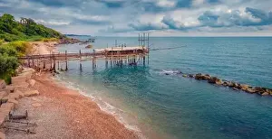 Lagoon Bay Prints: Gloomy summer view from flying drone of popular tourist attraction - Trabocco Turchino