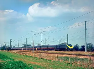 GNER class 373 regional Eurostar set 3303 and 3304 working an up service at Marholm on the 4th April 2003