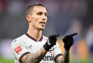Team Sport Prints: Goal celebration Alejandro Grimaldo Bayer 04 Leverkusen (20) Gesture