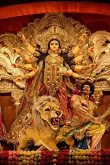Kolkata Prints: Goddess devi Durga idol decorated at a puja pandal in Kolkata