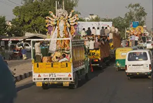 Departing Prints: Goddess Durga idol in a truck