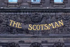 Floral Design Prints: Gold lettering 'THE SCOTSMAN' is set against a dark